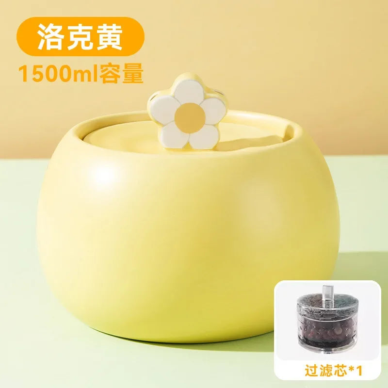 Pot de rangement jaune de 1500ml avec couvercle fleuri en plastique, idéal pour l'organisation.