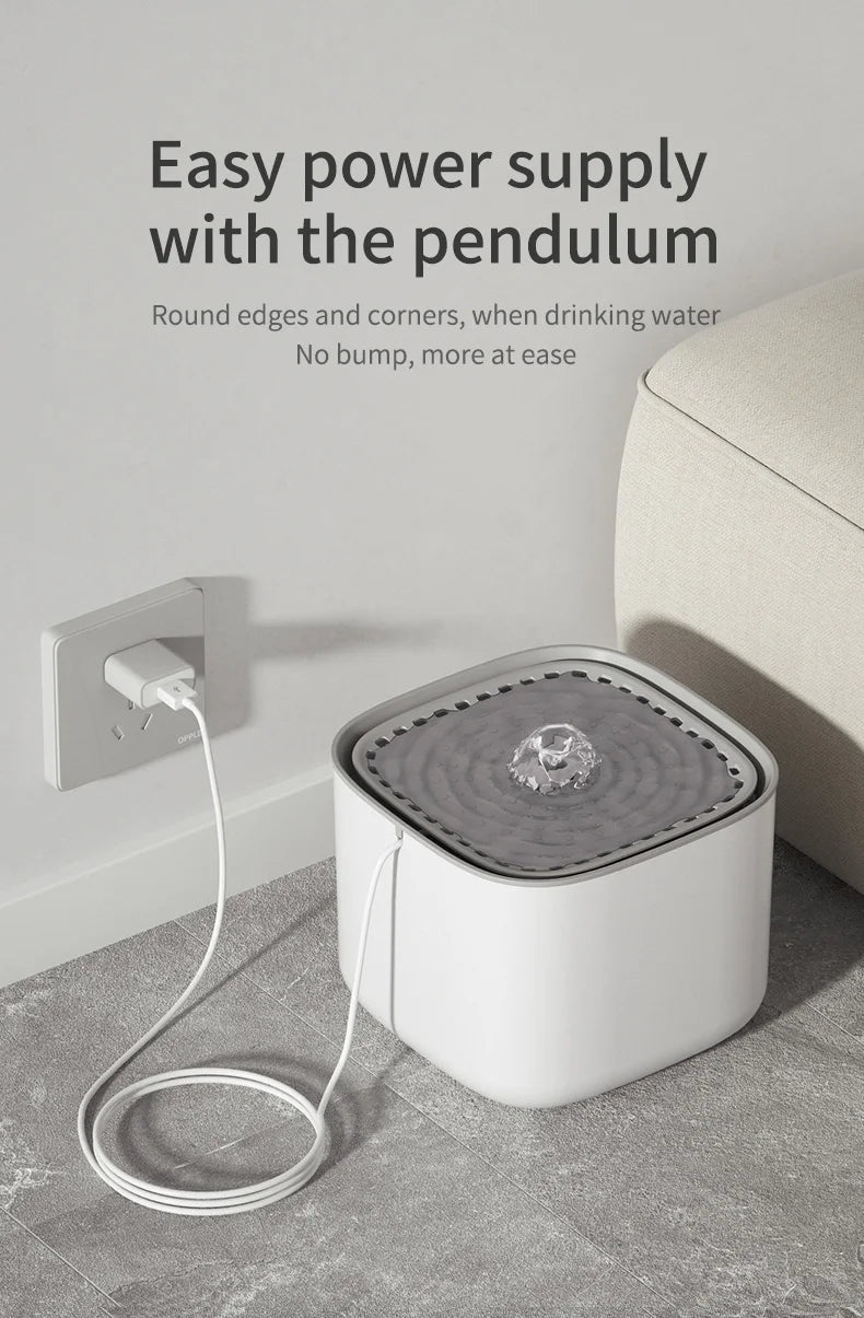 Distributeur d'eau moderne blanc avec angles ronds et alimentation pendule, design pratique et élégant.