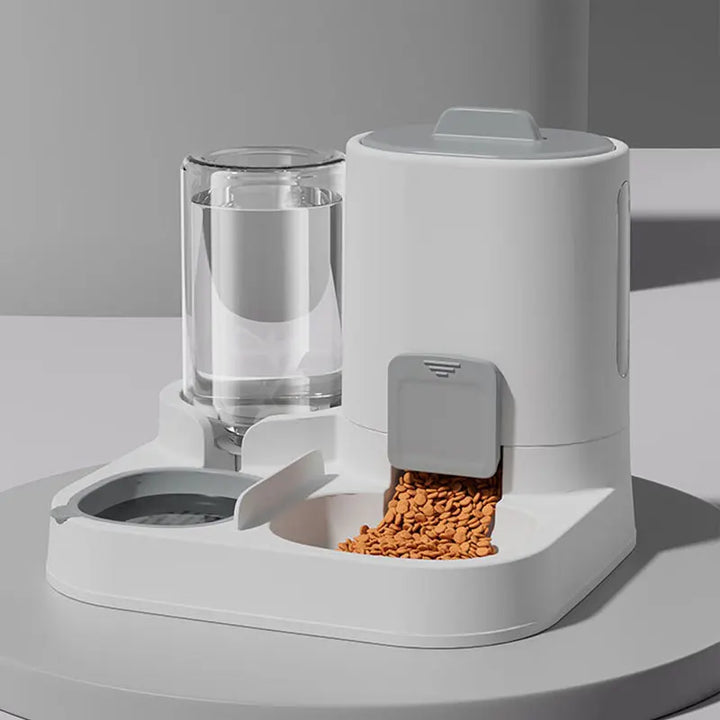 Distributeur automatique d'eau et de croquettes pour animaux, couleur blanche, design moderne.