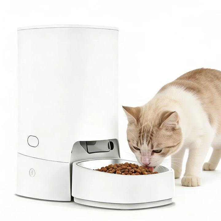 Distributeur automatique de nourriture pour chat blanc, avec bol, idéal pour les félins.