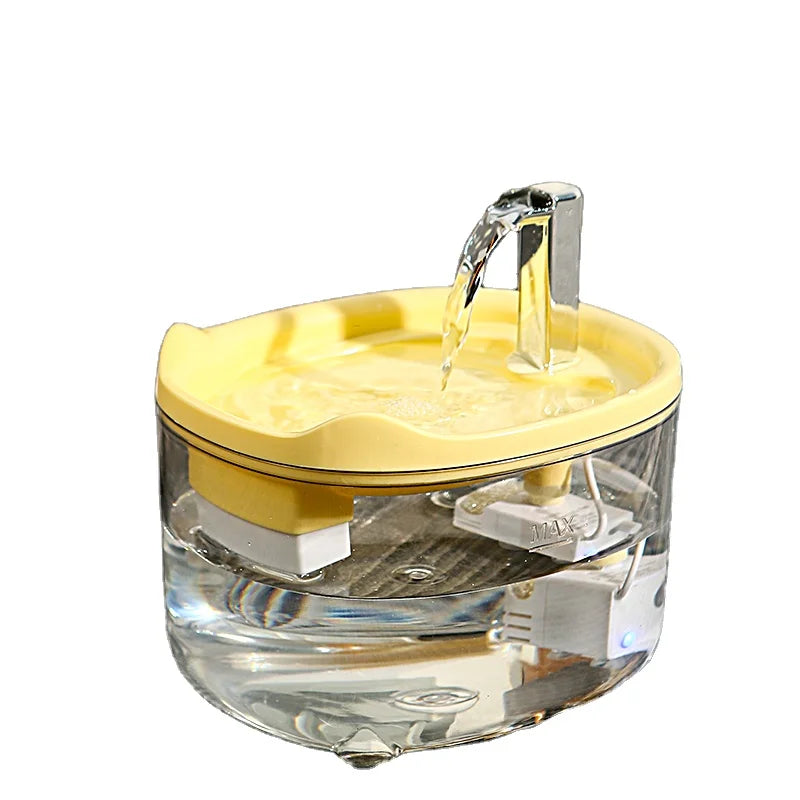 Fontaine à eau pour animaux, en plastique transparent et jaune, avec système de circulation d'eau.